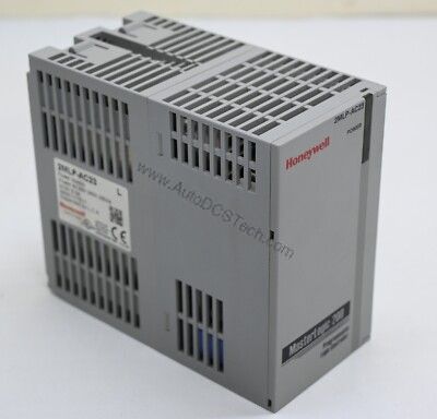 Figure 1: Front view of the Honeywell 2MLP-AC23 industrial automation component showing its physical design and enclosure.